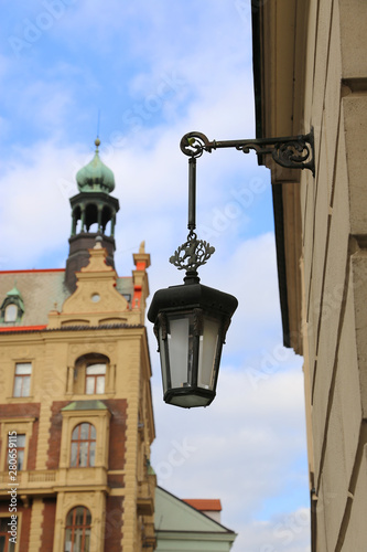 Traditional vintage street lamp and architecture of Prague