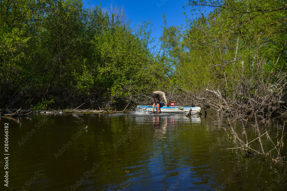fisherman on the river with kayak