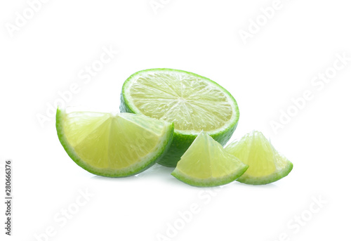 Half of lime citrus fruit (lime cut) isolated on white background.