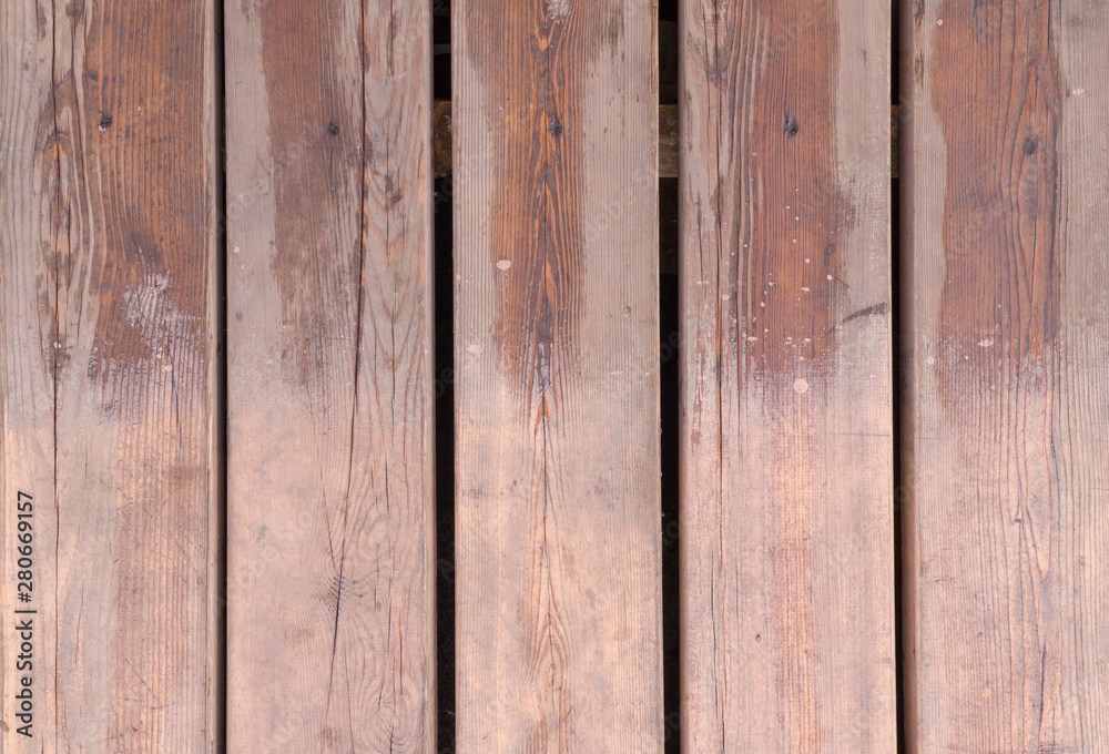 partially wet brown wooden planks texture. background partially wet brown wooden planks texture. background