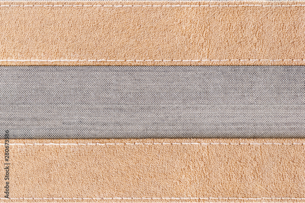 Fototapeta premium gray canvas seam with brown Fabric for use as banner or background