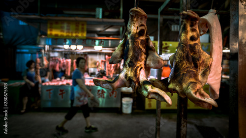 Raw Pig Face Hanging On Hook. Traditional Food Selding In Taiwan Market