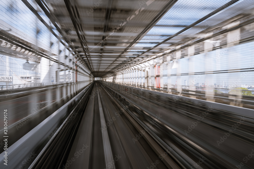 motion-blurred view from a moving train running in tunnel motion-blurred view from a moving train running in tunnel