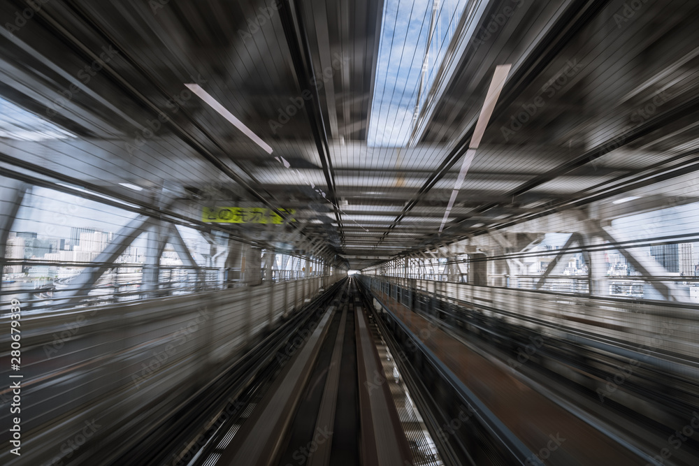 motion-blurred view from a moving train running in tunnel motion-blurred view from a moving train running in tunnel