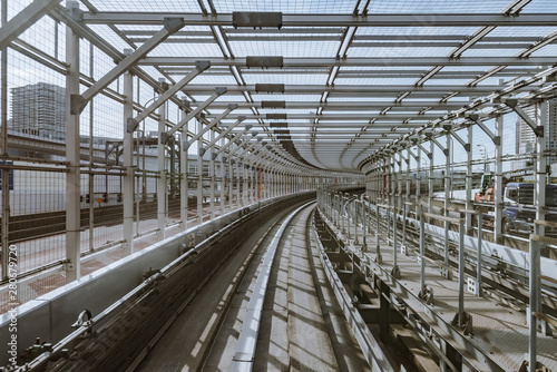 tunnel of monorail road view from front window of a moving train running