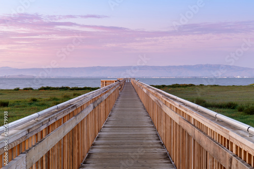 Twilight over the new boardwalk at Baylands Nature Preserve. Palo Alto, Santa Clara County, California, USA.