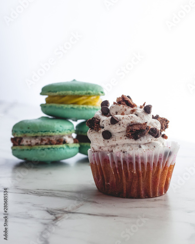 macaroons and cupcake with chocolate photo