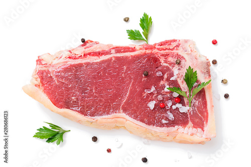 Fresh beef meat is ready for frying in a grill pan. isolated on white background