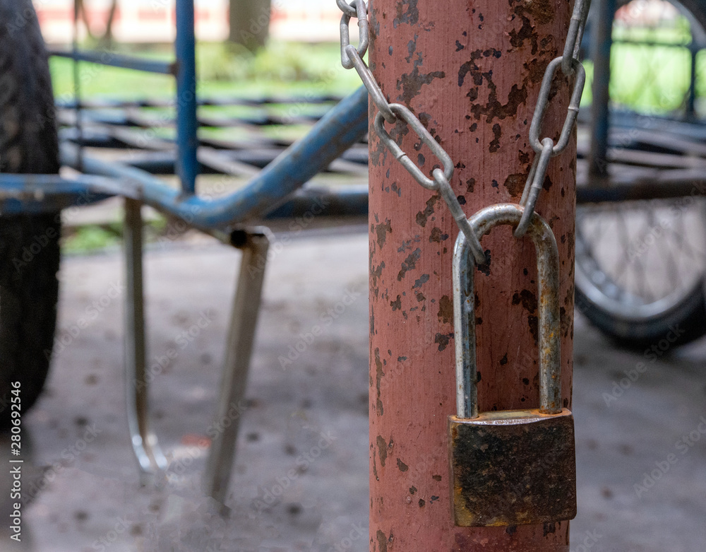 padlock on a fence