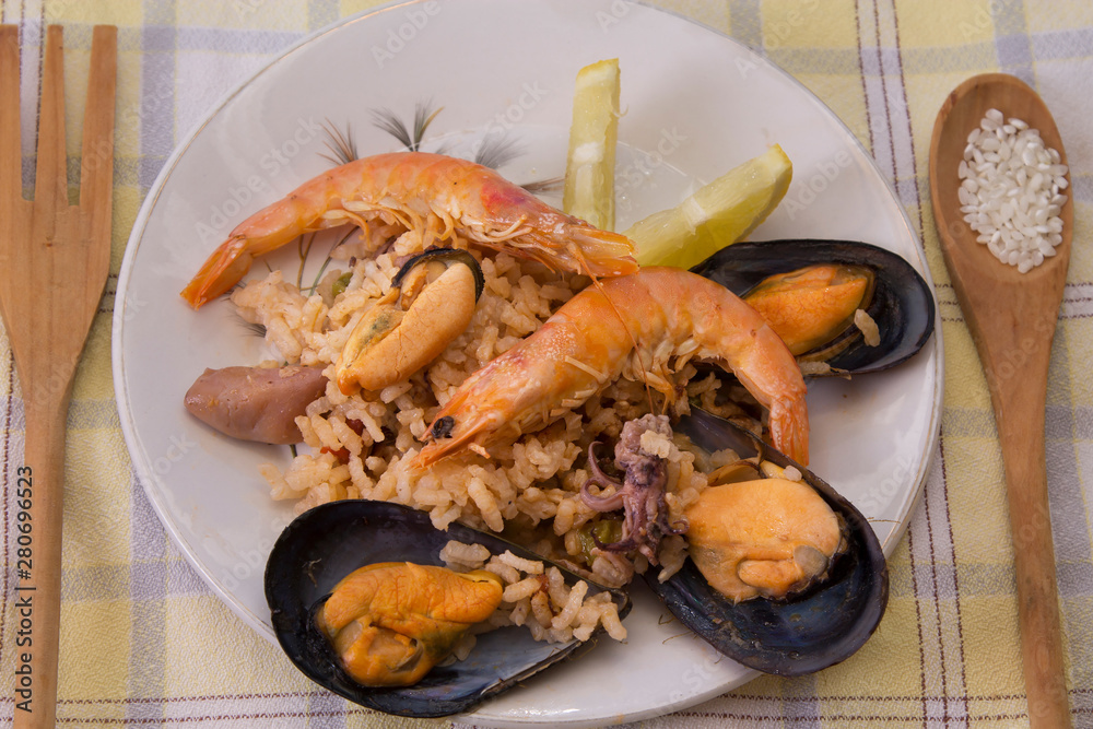 Tasty seafood dish – Paella a la marinera Tasty seafood dish – Paella a la marinera