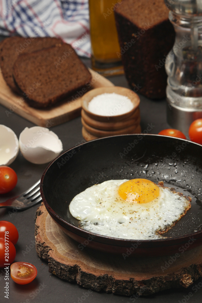 Fried egg with tomatoes and bread Fried egg with tomatoes and bread