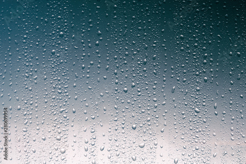 Water drops on glassy background