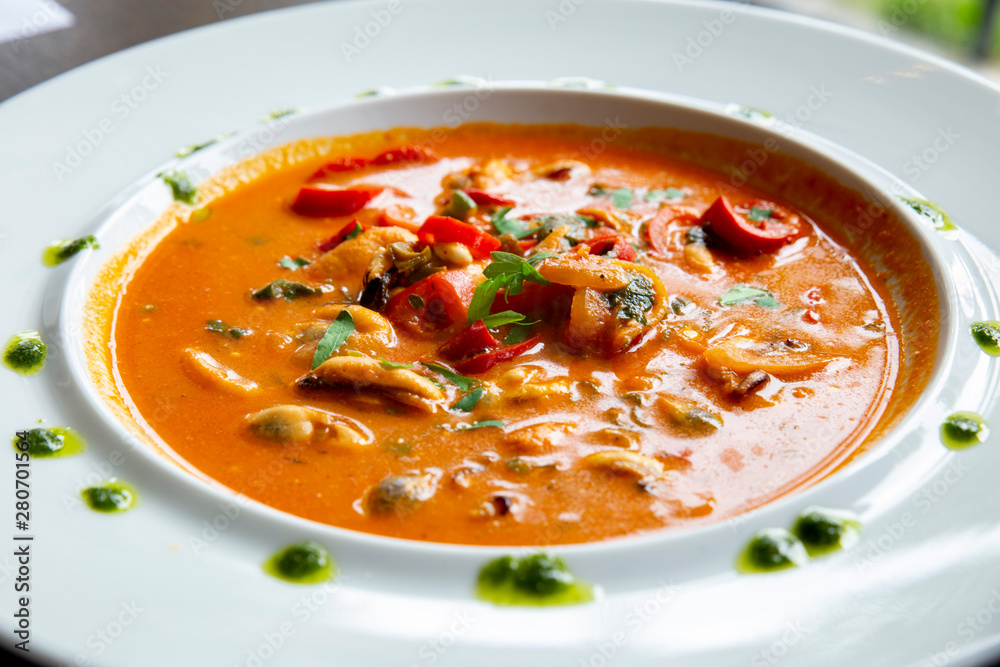 Gourmet Greek dish with mussels in red sauce