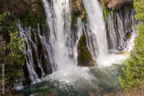 Close up of Burney Falls waterfall with Rainbow near Redding  in California