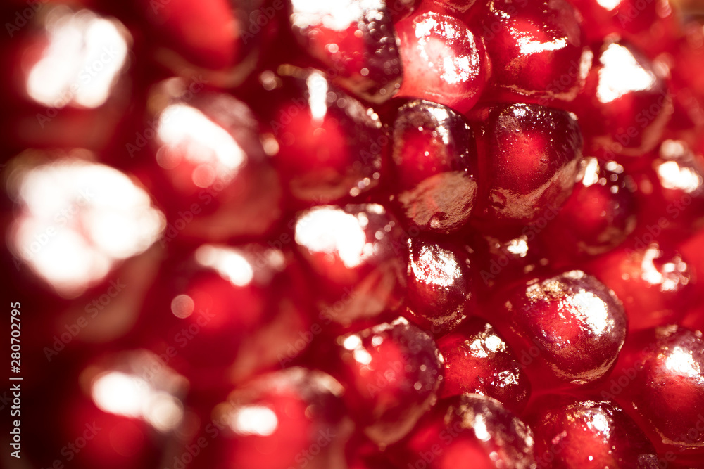 composition of ripe juicy pomegranate, berries pomegranate macro composition of ripe juicy pomegranate, berries pomegranate macro