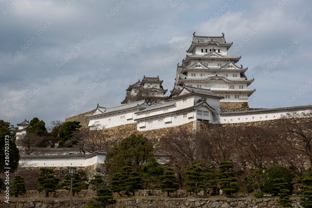 Himeji Castle and many layers of stone walls seen from afar, Kansai, Japan Himeji Castle and many layers of stone walls seen from afar, Kansai, Japan