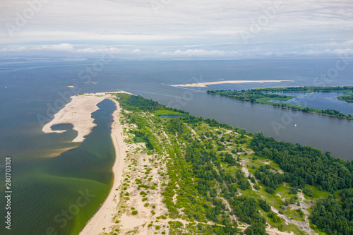 Aerial view of the Vistula river mouth to the Baltic sea. Poland. Photo made by drone from above. Bird eye view. photo