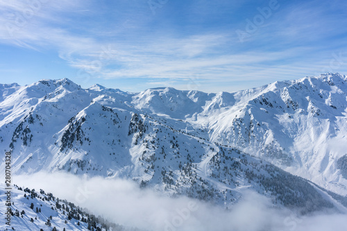 View of the  Alps from the top of Hochzillertal mountain photo