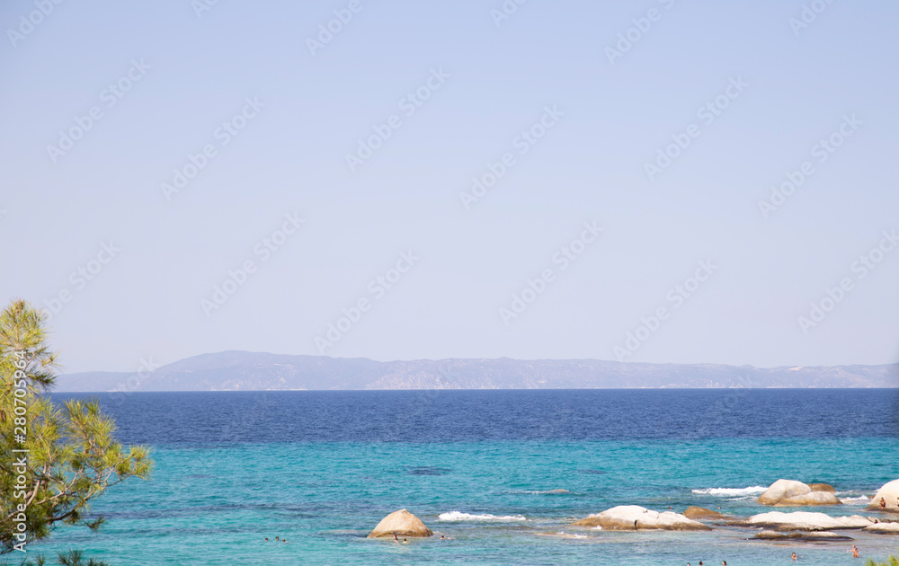 Stunning beach with round rocks, Halkidiki Greece