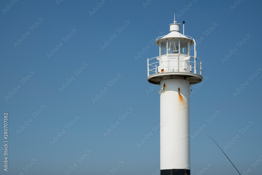 Lighthouse of Blankberge, Belgium. Blue sky, space for text. Lighthouse of Blankberge, Belgium. Blue sky, space for text.