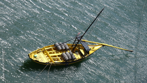 Boat with wine barrels in Porto