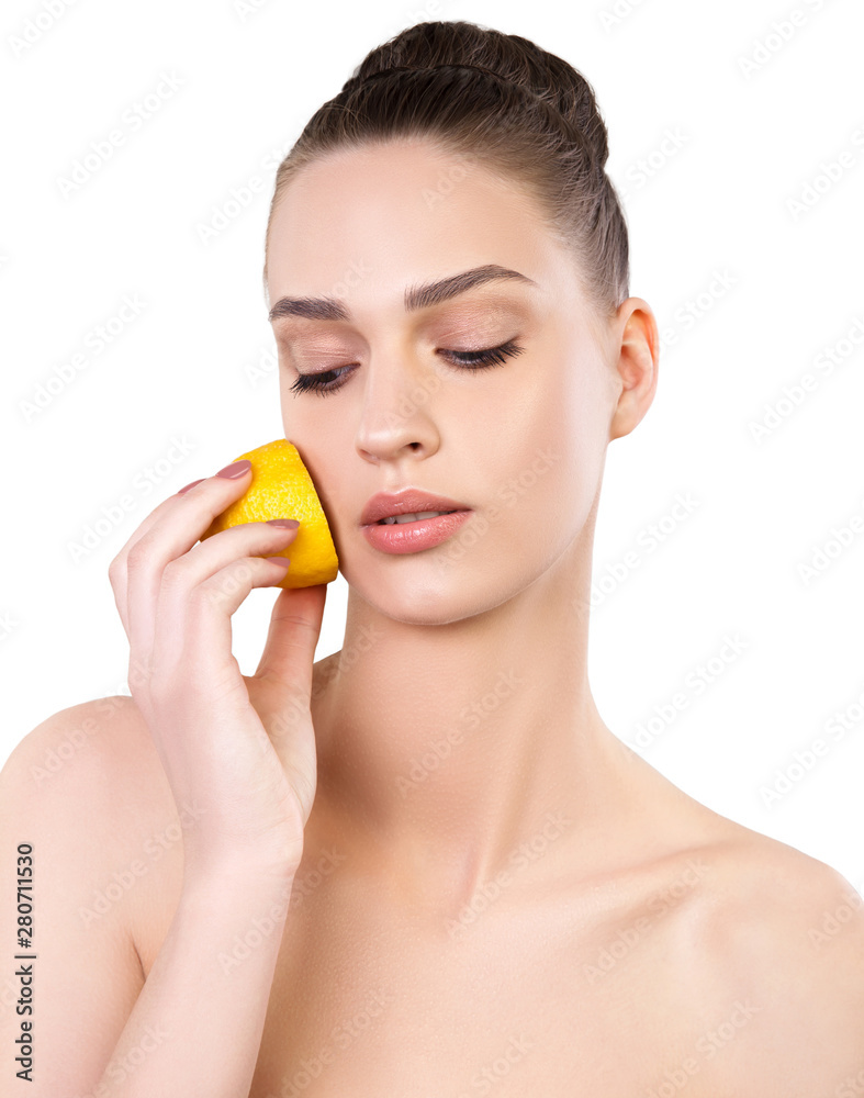 Isolated beautiful young woman with health fresh skin and lemon. Natural beauty treatment Isolated beautiful young woman with health fresh skin and lemon. Natural beauty treatment