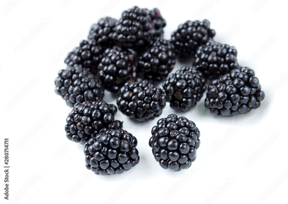 Ripe selected berries of blackberry on a white background Ripe selected berries of blackberry on a white background