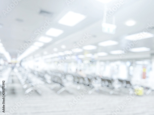 Blurred airport at departure seat. the hall that passengers wait to board the plane according to boarding time. Transportation and Travel concept. White abstract background