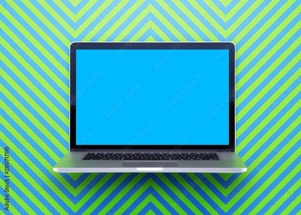 Computer staying on a table & showing the screen. Trendy & vibrant design. Geometry. Innovational digital internet applications & web business solutions. Modern workspace in an office. Development. Computer staying on a table & showing the screen. Trendy & vibrant design. Geometry. Innovational digital internet applications & web business solutions. Modern workspace in an office. Development.
