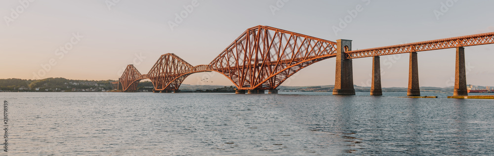 Fototapeta premium Sunset at the famous forth rail bridge in scotland