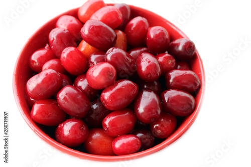 Cornelian cherry fruits, sour taste photo