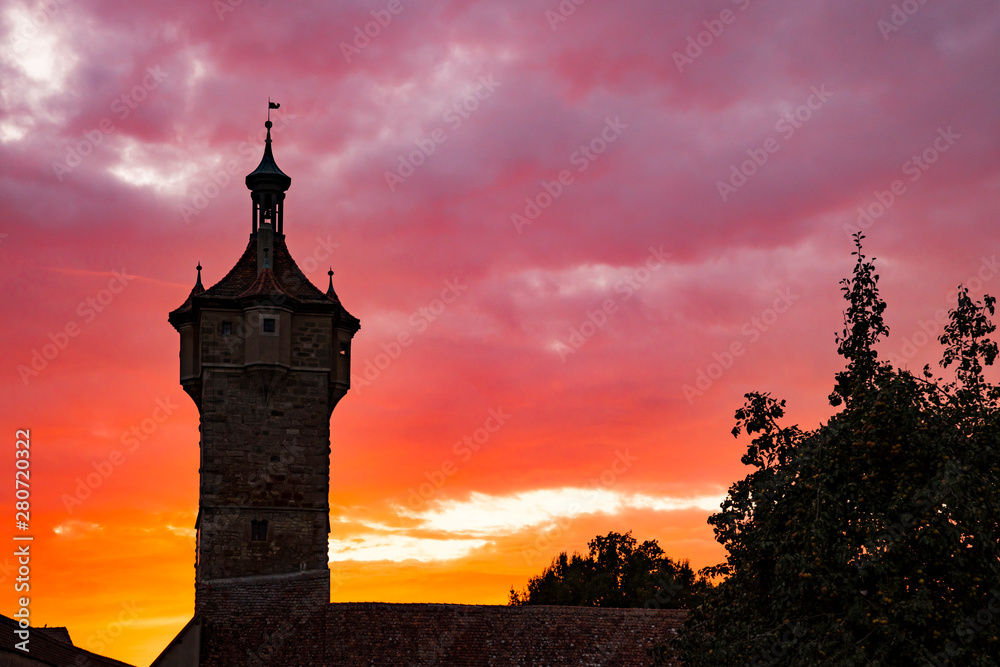 Silhouette Klingen Tower and city wall of  Rothenburg ob der Tauber, Germany by night. red sunset x_-3