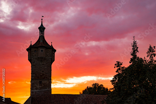 Silhouette Klingen Tower and city wall of  Rothenburg ob der Tauber  Germany by night. red sunset x_-3