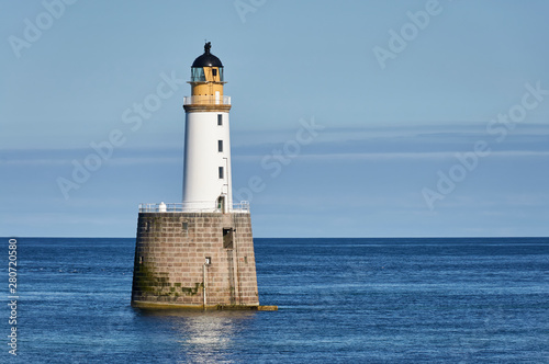Rattray Head Lighthouse just off Rattray Point in Aberdeenshire, Scotland, on one fine Summers Afternoon in calm conditions. © Julian
