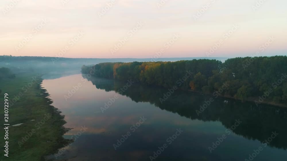 Aerial view of a foggy river, during autumn. Aerial view of a foggy river, during autumn.