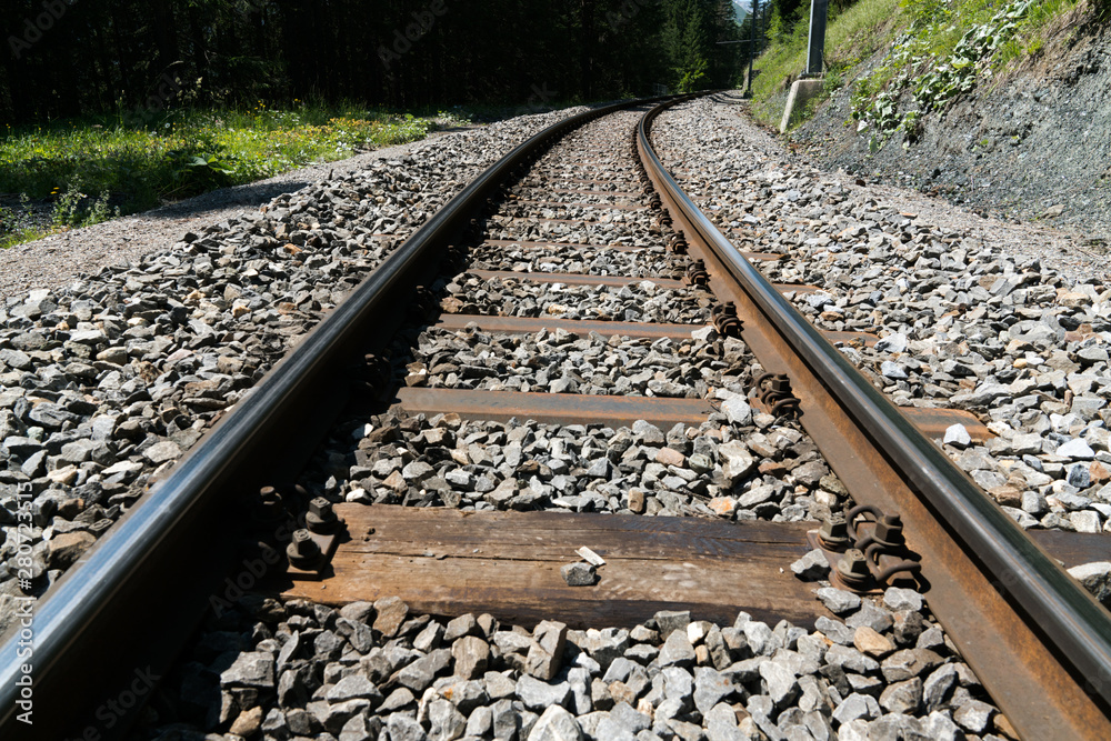 narrow gauge railroad tracks and rock bed close up view Stock Photo