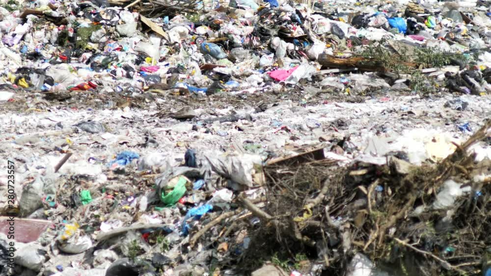 Plastic waste dumping site. Great rubbish dump, environmental problems. Garbage pile in trash dump or landfill. Earth pollution concept. Plastic waste dumping site. Great rubbish dump, environmental problems. Garbage pile in trash dump or landfill. Earth pollution concept.