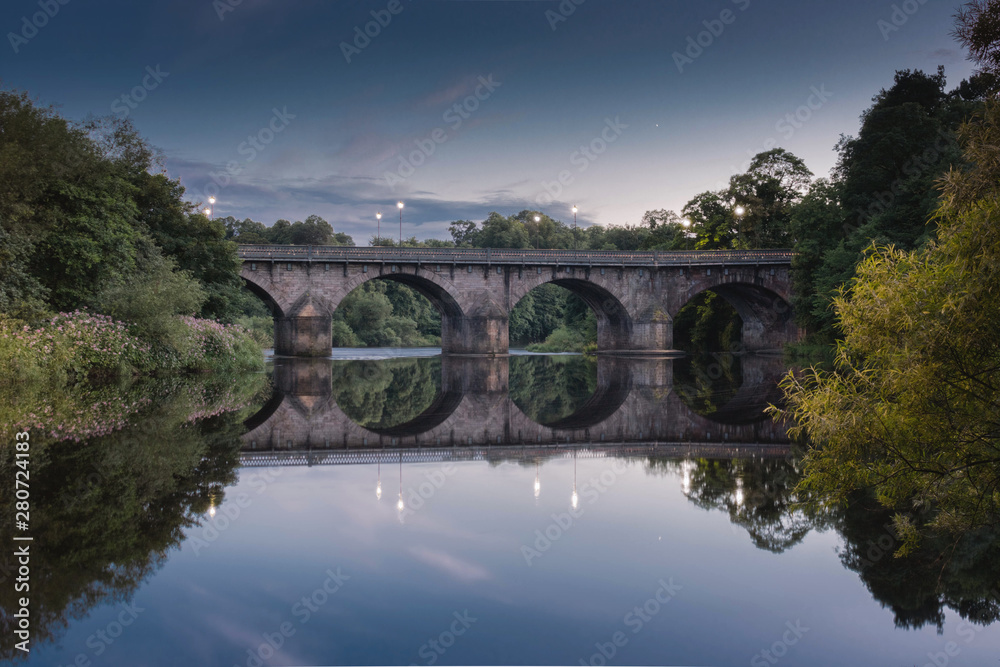 bridge over the river with perfect reflection
