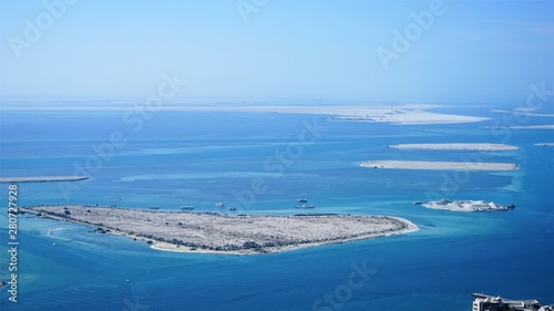 view of the blue sea and sand island