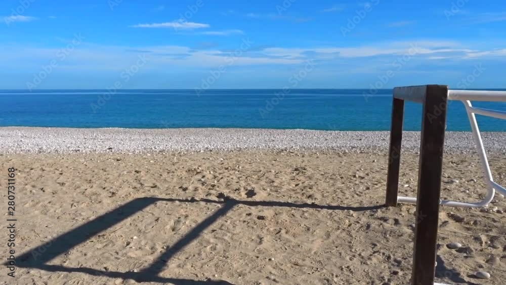 Moving shot of Lonely soccer goal posts on an empty beach. Moving shot of Lonely soccer goal posts on an empty beach.