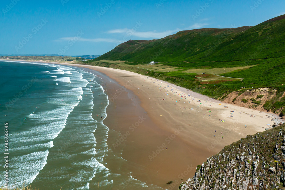 The huge, golden beach at Rhossili in the Gower area of Swansea, Wales