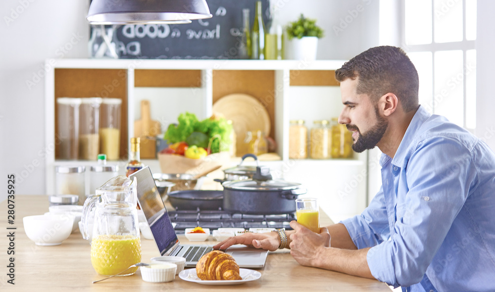 a business man breakfasts with notebook and juice a business man breakfasts with notebook and juice
