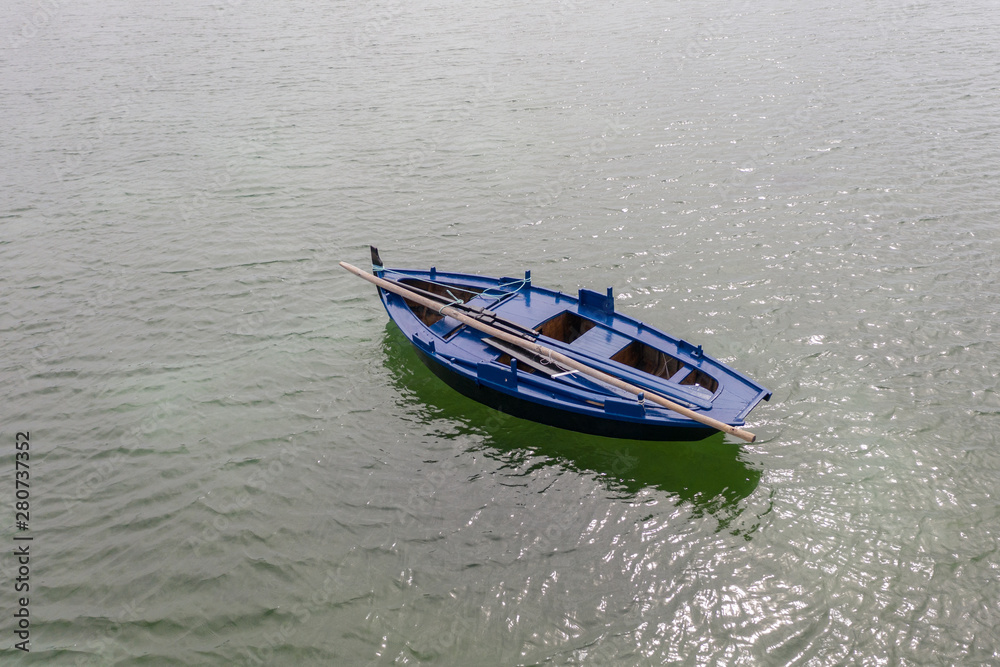 wooden fishing boat moored at the sea wooden fishing boat moored at the sea
