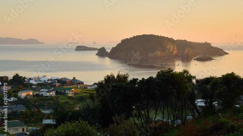 Hahei and a beautiful cliff lighted by the soft light of the sunset, Hahei, Coromandel Peninsula