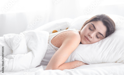 beautiful young woman basking in bed in the morning. Beautiful © lenetsnikolai