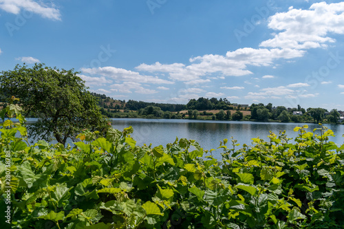 landscape with lake and blue sky