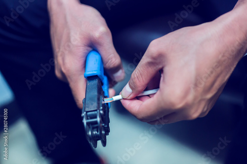 Bilde på lerret Connection procedure UTP cable, Twisting Cable Tool Twisted Pair Ethernet UTP Cat 5, Crimping RJ45 LAN cable, Stepping to crimping RJ45 connector