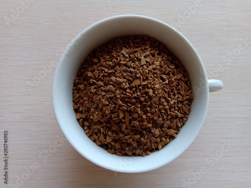 Granulated instant coffee in a cup