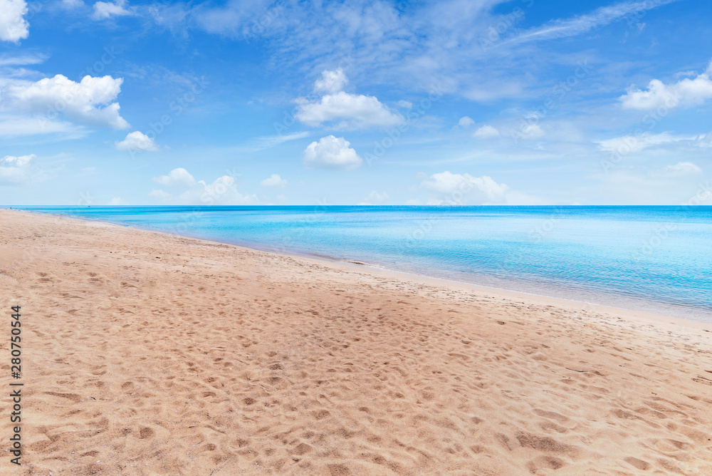Beautiful tropical beach and sea on blue sky background with copy space for text