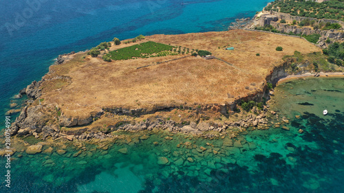 Aerial drone photo of iconic medieval castle and small picturesque village of Koroni  Messinia  Peloponnese  Greece